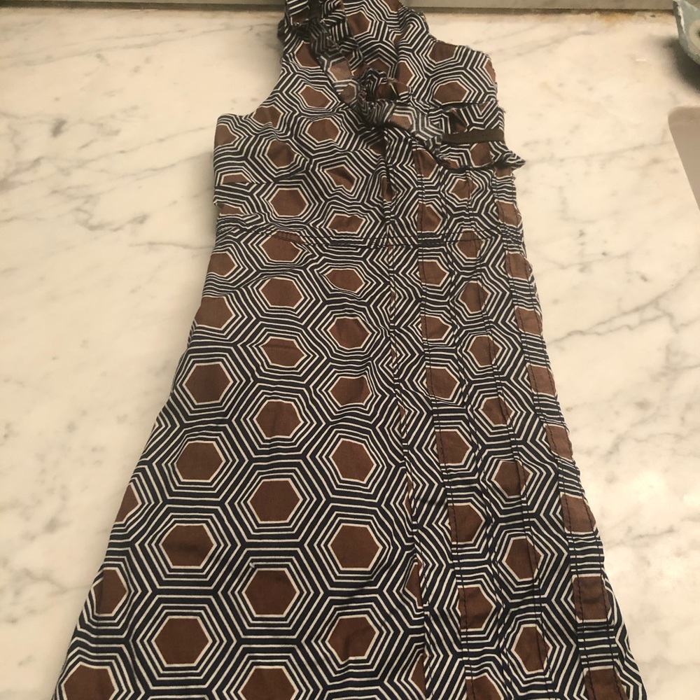 Tory Burch sleeveless blouse with pockets.